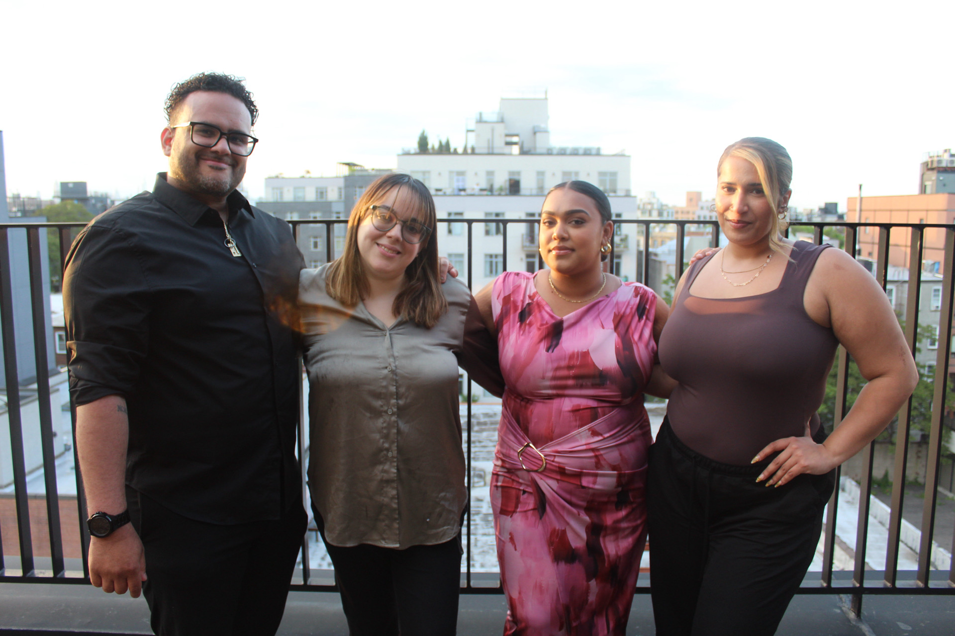 Safa Sanctuary team members standing together on a rooftop