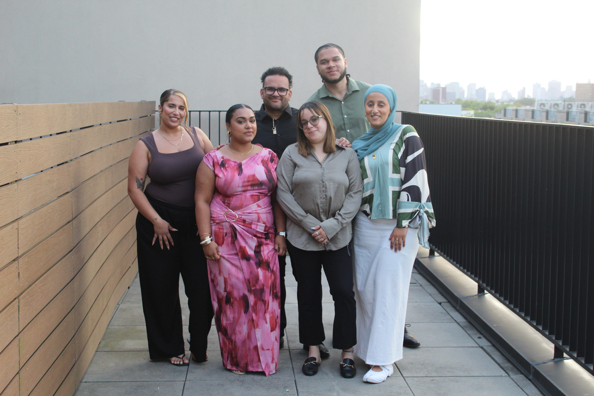 Safa Sanctuary team members standing together on a rooftop