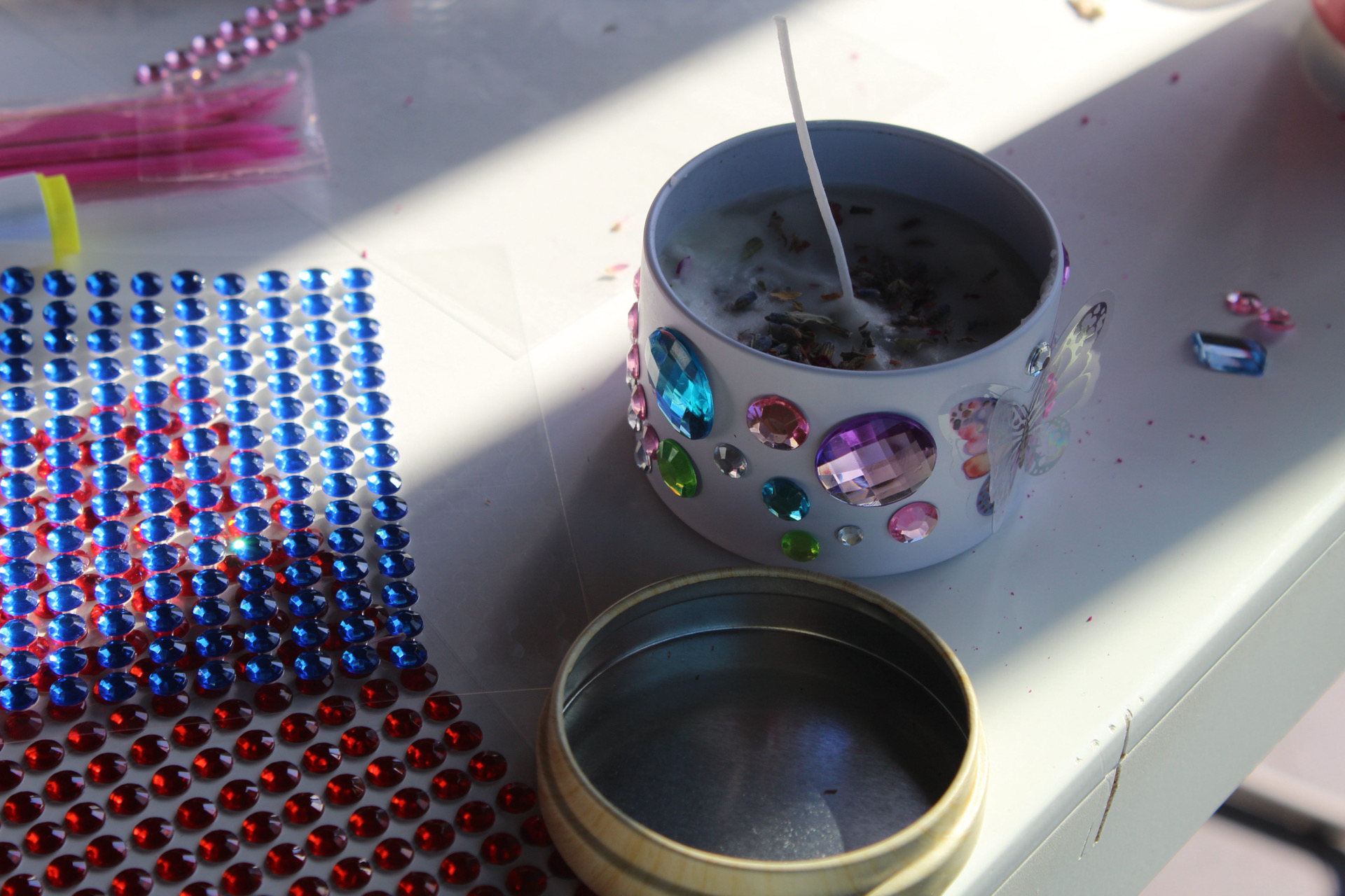 Decorated candle and activity materials from the Safa Sanctuary soft launch